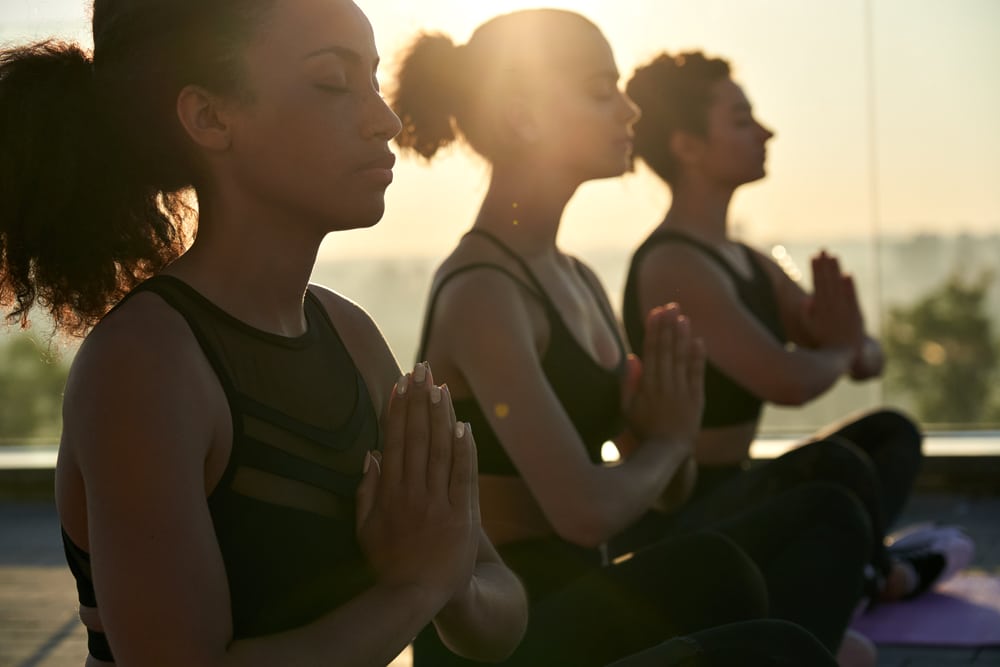 women enjoying yoga during a wellness retreat in Colorado